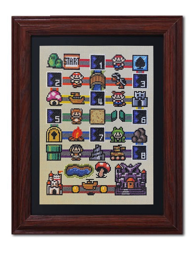 May include: Framed cross-stitch art depicting a pixelated video game scene. The artwork features a grid layout with game elements such as characters, castles, and the word "START". The frame is a dark brown colour.