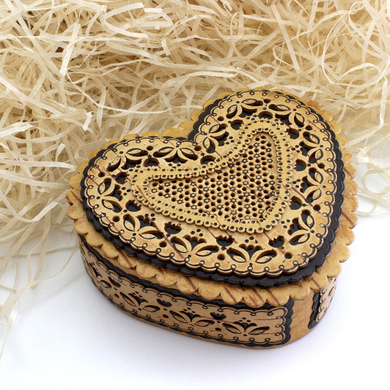 Heart-shaped box made of natural birch bark material. Inside is an image of an angel. Can be personalized