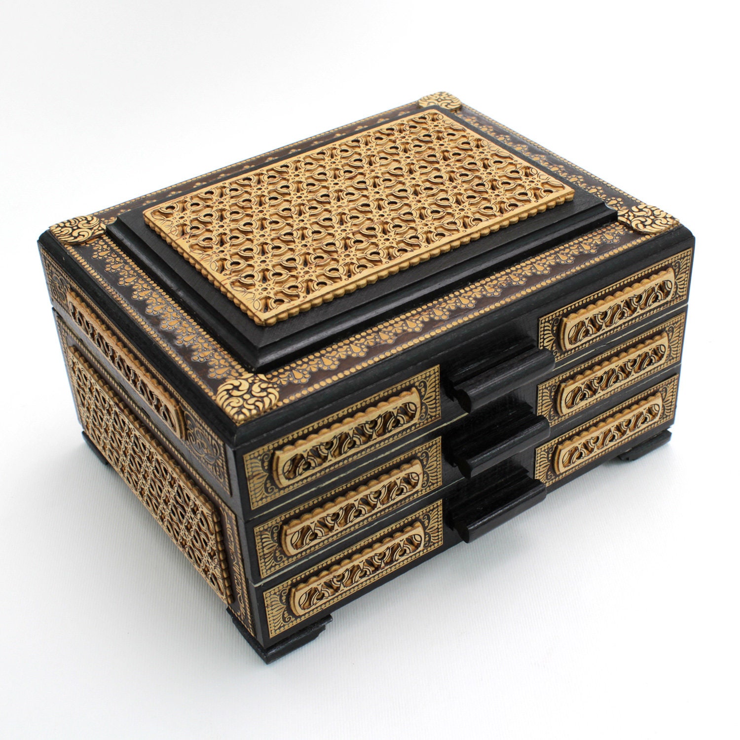 Tabletop wooden chest of drawers for jewelry, inlaid with carved birch bark. Has three pull-out tiers, velvet fabric inside. View 2