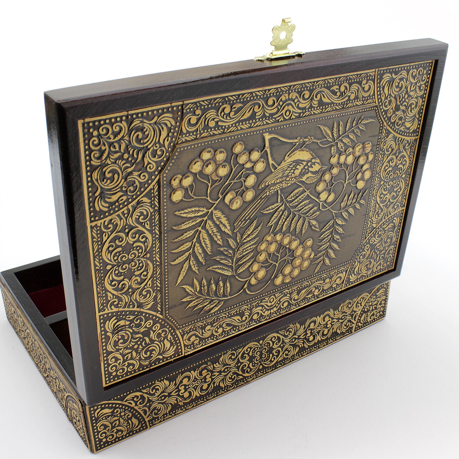 Handmade wooden jewelry box. Outside inlaid with birch bark with a relief pattern and decoration. Soft velvet inserts on the inside.