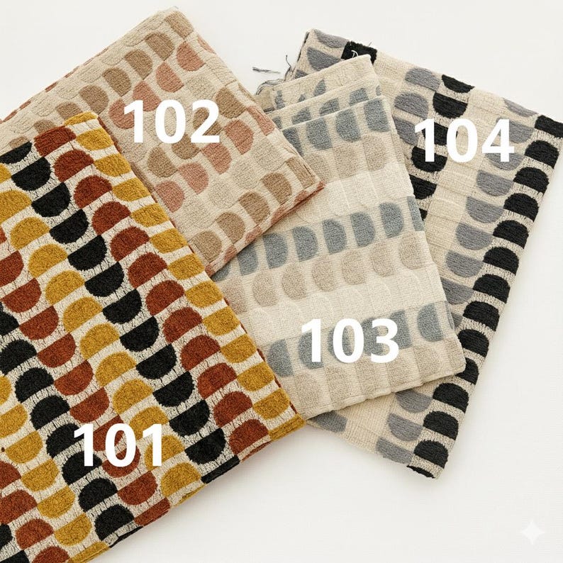May include: A selection of patterned fabric swatches in different colours. The swatches are labelled 101, 102, 103, and 104. The patterns feature semi-circles and rounded shapes in yellow, brown, black, beige, and grey.