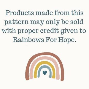 May include: A colorful rainbow with a heart in the center. Text reads: "Products made from this pattern may only be sold with proper credit given to Rainbows For Hope."