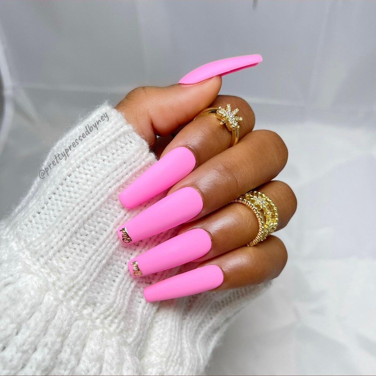 matte pink nails with design