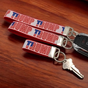 Llavero con el logo del presidente Donald Trump, llavero de muñeca, llavero con cremallera para mochila.