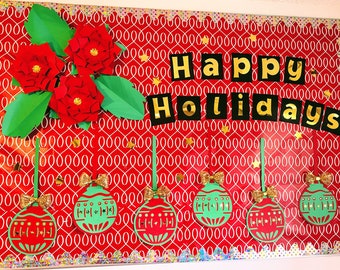 May include: A red bulletin board with a white and red patterned background. The bulletin board has a gold glitter border. The words "Happy Holidays" are written in gold letters on the bulletin board. There are five red and green paper ornaments hanging from the bulletin board.