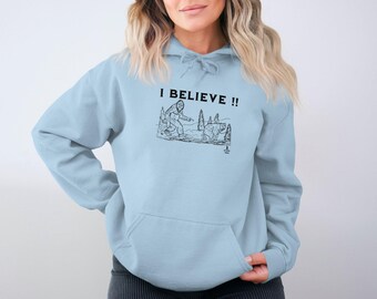 Bigfoot Sasquatch I Believe T Shirt Funny Graphic Tee Unique Gift for Bigfoot Enthusiasts Cool Novelty Top for Men and Women