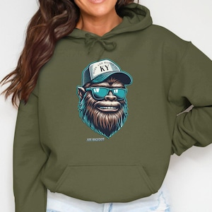KY Retro Bigfoot-hoodie, geboren en getogen in KY, grafische Sasquatch-hoodie, vintage-stijl sweater, uniek Bigfoot-ontwerp, coole vrijetijdskleding