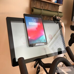 Exercise bike, I-Pad, Tablet holder, fits bike monitors, Bike and Bike + Tread and Tread + and most monitors less than 1" thick. USA made Large height 9 inches