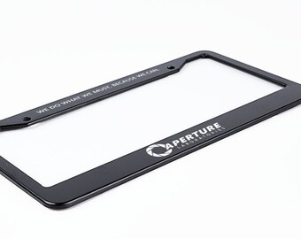 Aperture Labs License Plate Frame | Portal inspired License Plate Holder | We do what we must because we can | Gamer Auto Accessories