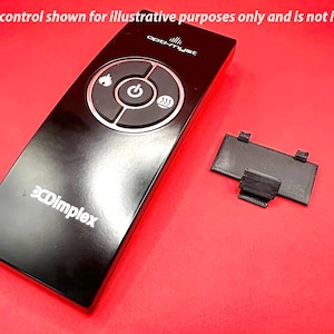 May include: Black remote control with a circular button pad featuring a flame icon, power button, and a heating element icon. The remote control has the text "opti-must" and "XDimplex" printed on it.