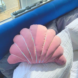 Mermaid shell cushion with sequin trim