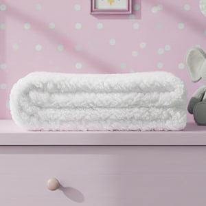 May include: A folded white blanket with a thick, plush, sherpa-like texture. The blanket is rectangular in shape and features a dense, curly pile surface that appears soft and warm. It is positioned horizontally, showcasing its layered, folded structure.