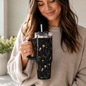 Large Capacity 40oz Tumbler Insulated Stainless Steel Travel Mug With Handle Straw Included Wildflower Black Design Keeps Hot Cold Beverages Perfect Temperature Double Wall Insulation Comfortable Grip Handle Daily Commute Office Essential
