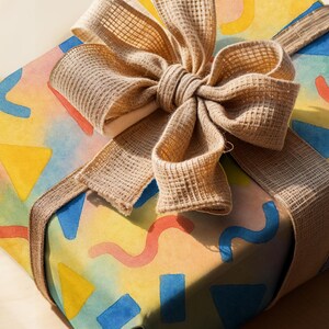 Kids Birthday Gift Wrap Vibrant Colorful Wrapping Paper Festive Celebration Sheet Geometric Pattern Design Yellow Blue Colors Eco Friendly Wrapping Supplies Custom Eclectic Style Matte Finish Paper Kids Party Celebration Gift Wrap