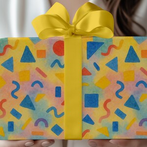 Colorful Geometric Gift Wrap Kids Birthday Party Wrapping Paper Festive Celebration Sheet Yellow Blue Pattern Design Eco Friendly Wrapping Supplies Custom Eclectic Style Vibrant Colors Matte Finish Paper Kids Party Gift Wrap Anniversary