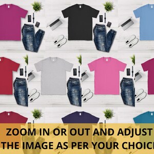May include: A flat lay image of ten plain t-shirts in various colors, including pink, black, light blue, red, gray, hot pink, maroon, purple, and teal. Each t-shirt is laid out on a white wooden surface with a pair of jeans, a laptop, a phone, a watch, and a pen.