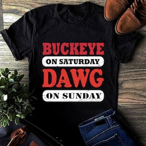 Buckeye On Saturday Dawg On Sunday Cleveland Ohio Funny T-Shirt Buckeye On Saturday Dawg On Sunday Cleveland Ohio Funny T-Shirt