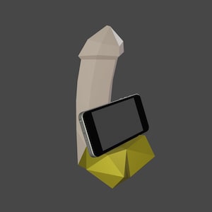 May include: A digital illustration of a beige, geometric shape resembling a penis, with a black smartphone resting on a yellow geometric shape. The background is a solid dark gray.