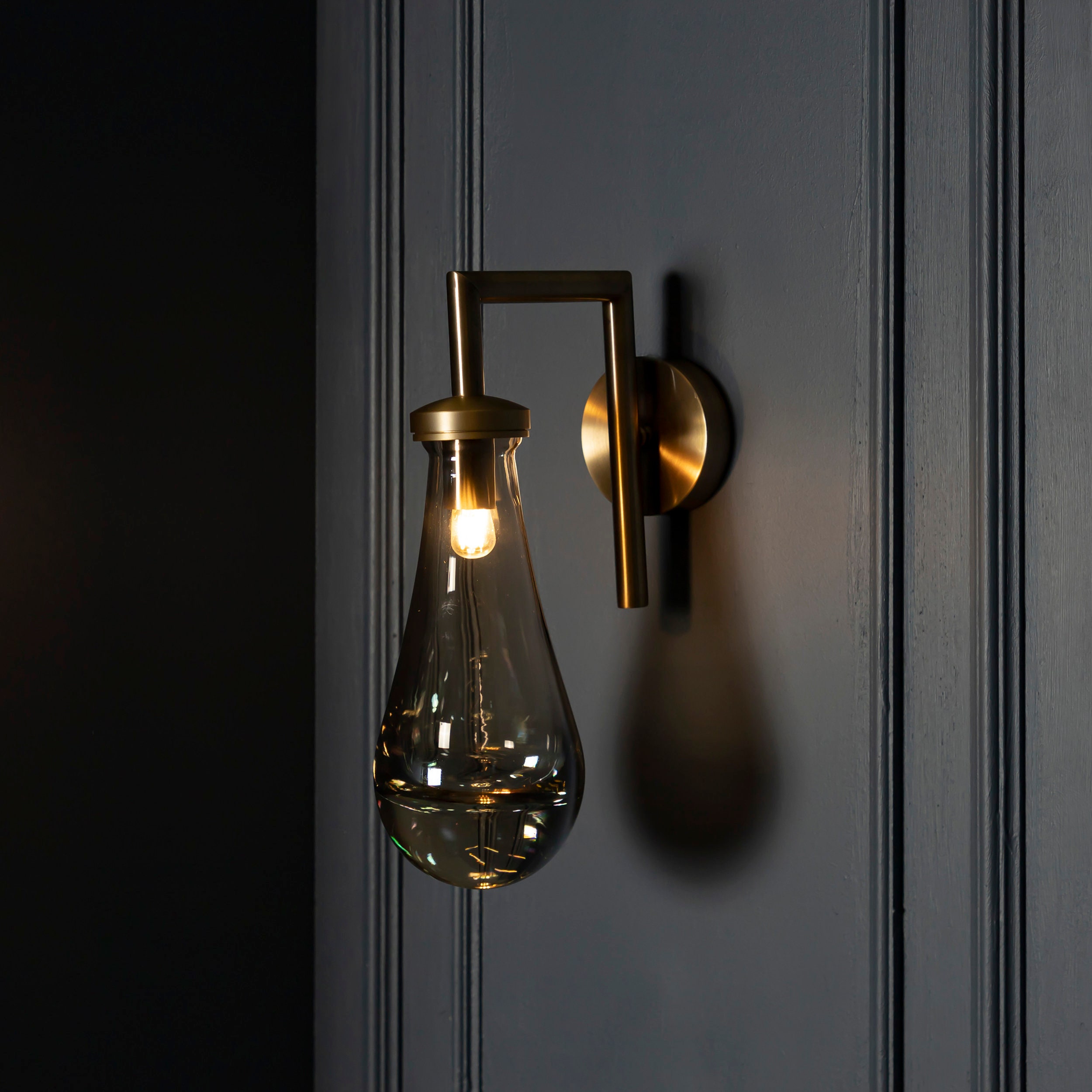 Amber glass sconce deals