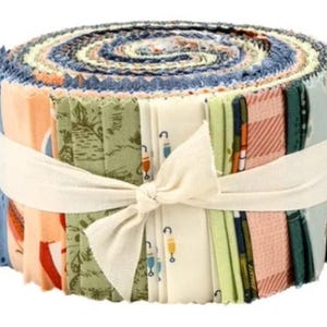May include: A rolled bundle of fabric strips in various colors and patterns, including blue, orange, green, and cream. The fabric is tied with a cream-colored ribbon. The bundle appears to be for quilting or other fabric crafts.