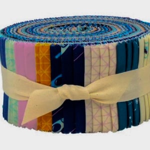 May include: A rolled bundle of fabric strips in various colors, including blue, pink, and yellow, is secured with a cream-colored ribbon. The fabric appears to be cotton, and the bundle is tightly wound, showcasing a variety of patterns and hues.