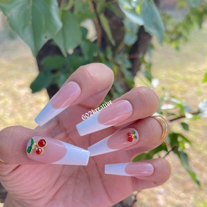 White french tip press on nails with cherry charm