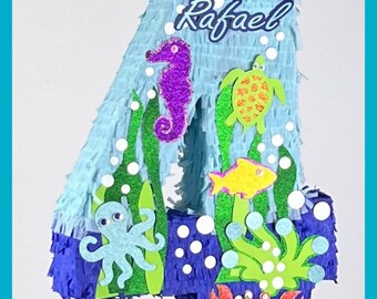 SEA WORLD. sea shells. fishing nets flowers. Octopuses. We personalize your PIÑATAS