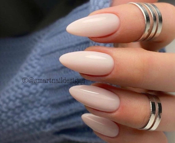 milky pink almond nails
