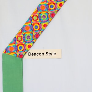 Lots of Circles Da98 Deacon Clergy Stole, Rainbow of colors, cotton, short length, sewn closure, cross over chest design, lined with green
