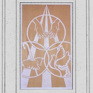 May include: A beige cutwork wall hanging featuring a design of the Trinity, with hands, a dove, and a lamb. The design is enclosed within a circle and a triangle. The title "The Trinity" is written below the design, along with the number "#277" and the dimensions "33.5" x 60". The copyright information "© 2012 Sarah Brogdon" is also included.