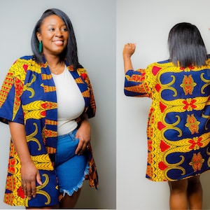 May include: A blue, yellow, and red patterned kimono with a long, flowing design. The kimono has a relaxed fit and is made of a lightweight fabric.