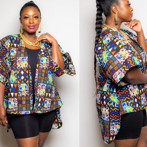 May include: A colorful patterned kimono with a brown background and geometric shapes in blue, yellow, orange, and white. The kimono has a long, flowing design and is open in the front.