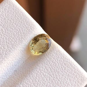 0.70 Carat Ceylon Yellow Sapphire: Faceted Oval Gemstone