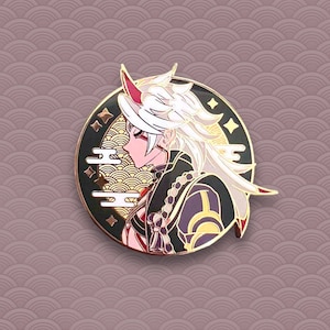 May include: A gold and black enamel pin featuring a character with white hair and red horns. The character is wearing a black and gold outfit with a long white scarf. The pin is set against a background of gold and black waves.