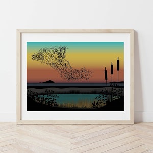 May include: A framed print depicting a silhouette of a flock of birds flying over a lake at sunset. The sky is a gradient of blue, yellow, and orange. There are tall reeds in the foreground.