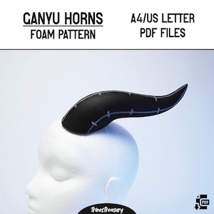 May include: Black foam horns with stitching details, designed for cosplay or costume making. The horns are shown on a white mannequin head. The image includes the text "GANYU HORNS FOAM PATTERN A4/US LETTER PDF FILES".