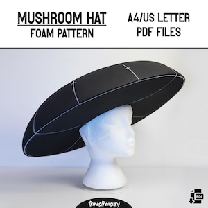 May include: A black foam mushroom hat pattern for crafting. The pattern is printed on A4/US Letter size paper and includes instructions for making the hat. The hat is shown on a white mannequin head.