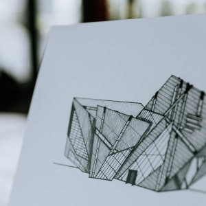 May include: A black and white line drawing of a modern building with a geometric design. The drawing is on a white background.