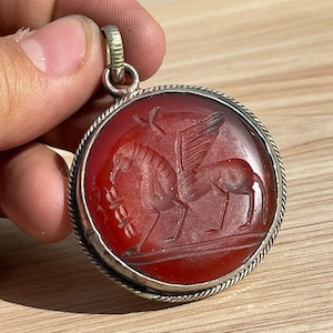 Ancient Agate Stone Pendant: Winged Animal Engraving, Brass Setting