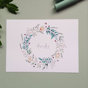 Hand-painted greeting card "Thank you" with floral wreath