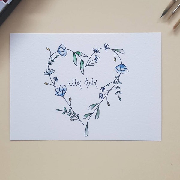 Tarjeta de felicitación pintada a mano "Todo lo mejor" con un corazón floral