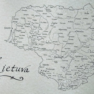 May include: A black and white map of Lithuania with the names of cities and towns labeled in Lithuanian. The map includes a compass with a yellow, green, and red compass rose.