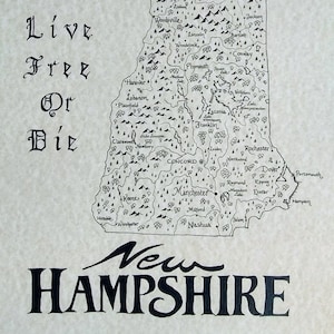 May include: A black and white map of New Hampshire with the state's motto "Live Free or Die" printed in a decorative font. The map shows the state's major cities and towns, including Concord, Manchester, Nashua, and Portsmouth.