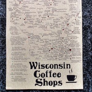 May include: A map of Wisconsin with coffee shops marked on it. The map is drawn in a vintage style with brown paper and black ink. The map is titled "Wisconsin Coffee Shops".
