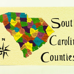 May include: A map of South Carolina counties with each county outlined in a different color. The map is on a beige background with the words "South Carolina Counties" in black.