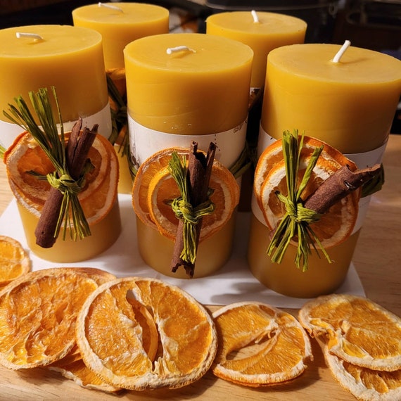 Beeswax100% natural , hand-poured beeswax candle, enhanced with dried  orange slice and cinnamon stick this is for ONE Beeswax candle.