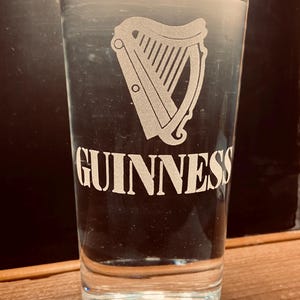 Original Irish Stout Glass Style used in Vintage Guinness Posters Etched with 1960s Guinness Harp Logo