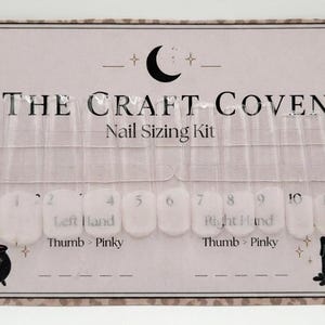 May include: A nail sizing kit from "The Craft Coven" with clear plastic nail samples. The card has a decorative border with a crescent moon and stars. The kit includes sizes 0-10 for both left and right hands, thumb to pinky.