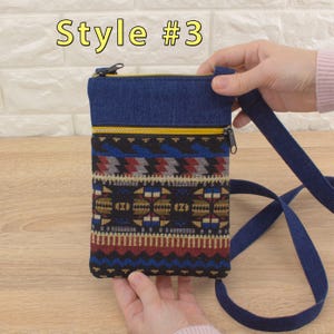 Handmade crossbody bag labeled 'Style #3', featuring a dark blue denim top section, yellow (golden color) zippers, and a bottom pocket made from tapestry textile (geometric pattern).