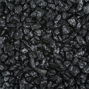 May include: A close-up view of black gravel stones. The stones are small and irregular in shape, with a smooth, polished finish.